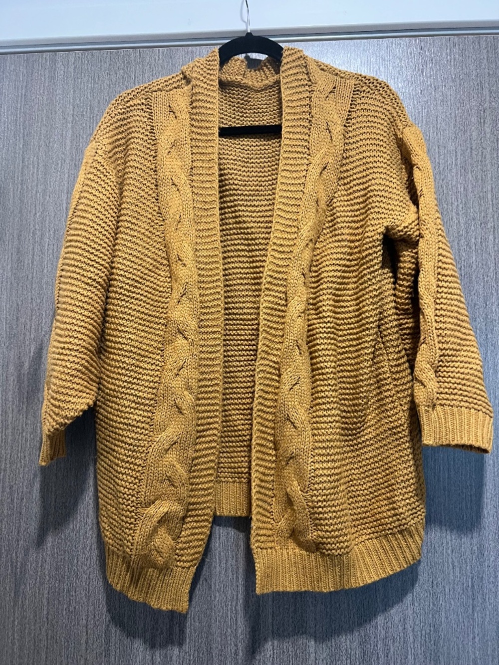 mustard colored cable knit cardigan sweater